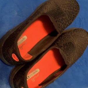 Sketchers black print Go Walk slip one.